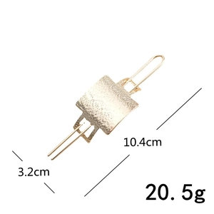 Hollow gold metal hair pin dimensions showing 10.4cm length and brushed texture finish