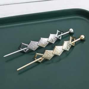 Minimalist geometric gold and silver hair sticks with hammered rhombus texture