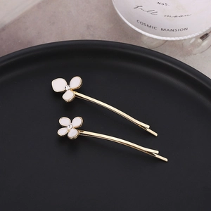 Barrettes élégantes en métal doré avec fleurs blanches et cristaux clairs pour femme