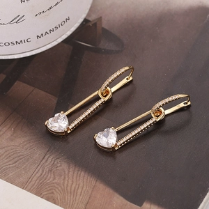 Elegant gold pin earrings with heart-shaped zircon and sparkling pave crystals
