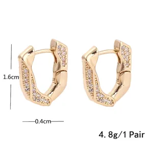 Geometric gold-plated copper hoop earrings with inlaid zircons and U-shaped design