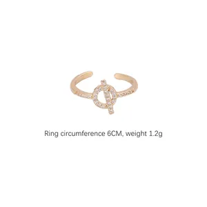 Gold geometric ring with micro-pave zircons, circumference 6cm and weight 1.2g