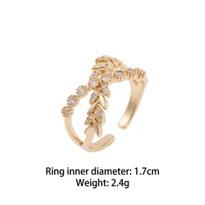 Gold adjustable leaf ring with zircon accents, 1.7cm inner diameter and 2.4g weight