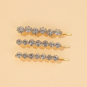 Ensemble de trois barrettes dorées avec strass et motifs floraux en cristal élégants