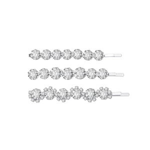 Lot de trois barrettes argentées avec strass brillants et motifs de fleurs
