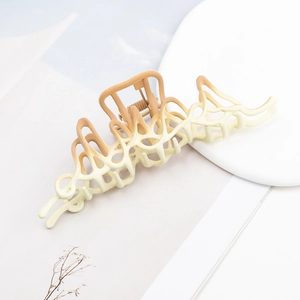 Gradient hair claw clip with hollow geometric design in large matte caramel finish