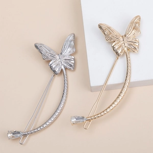 Elegant gold and silver butterfly hair clips with moon crescent curve and zircon detail