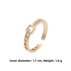 Detail view of gold adjustable ring with micro-set zircon and belt buckle design