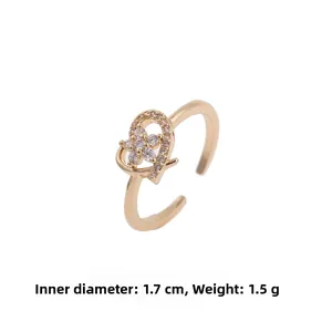 Detail of gold heart ring showing dimensions: 1.7cm inner diameter and 1.5g weight