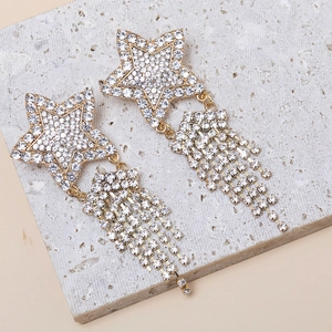 Sparkling gold star tassel earrings with white rhinestones for formal evening parties