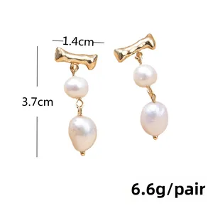 Detailed size view of retro tassel earrings with gold metal and baroque pearls