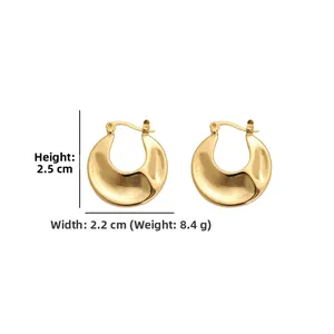Detail view of gold U-shaped earrings with dimensions 2.5cm height and 2.2cm width