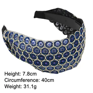 Ethnic wide embroidered headband with blue sequins and gold thread floral details
