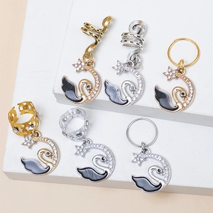 Sparkling crystal swan and moon hair rings for braids in gold and silver finishes