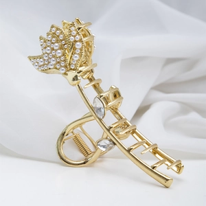 Elegant gold metal tulip hair claw clip with faux pearls and marquise crystal accents