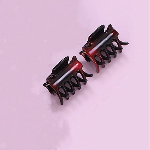 Set of two small resin hair clips with elegant dark red to black gradient glaze finish