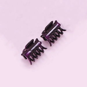 Set of two small dark purple resin hair claw clips for daily hairstyling and bangs