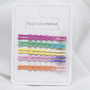 Set of ten colorful wavy bobby pins in five gradient candy colors on white display card