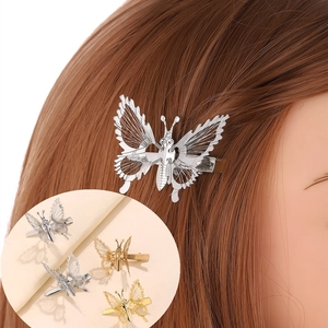 Elegantes pinzas para el cabello de mariposa de metal hueco en acabado dorado y plateado
