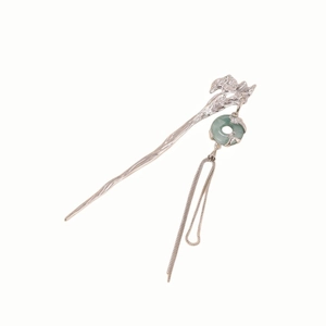 Elegant silver hair stick with green jade-like pendant and long chain tassels in white background