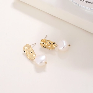 French vintage baroque pearl earrings with textured gold plating in minimalist style