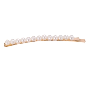 Detailed close-up of an elegant gold hair clip featuring a row of fourteen round white pearls