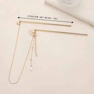 Vintage Chinese gold hair stick featuring heart fan charms and elegant water drop tassel
