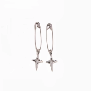Silver punk safety pin earrings with hollow star pendants in minimalist gothic style