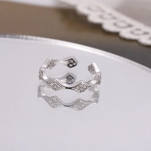 Adjustable silver wavy open ring for women with micro-paved cubic zirconia stones