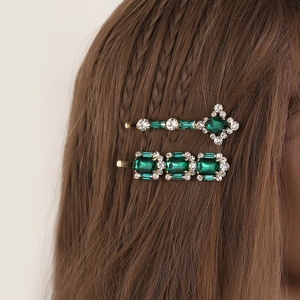 Set di fermagli per capelli dorati con cristalli verde smeraldo e strass da donna