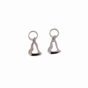 Polished silver metal heart-shaped earrings with round hoops on white background