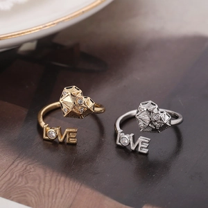 Adjustable heart ring with LOVE engraving and white zircon in gold and silver finish