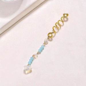 Golden spiral hair jewelry with light blue crystal beads and a square opal pendant