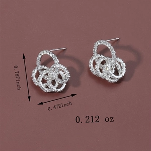 Boucles d'oreilles créoles en argent avec strass et anneaux entrelacés avec clous S925