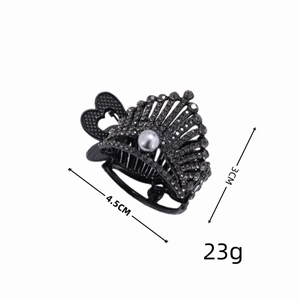 Pinza per capelli a corona in metallo nero con strass grigi e perla bianca centrale