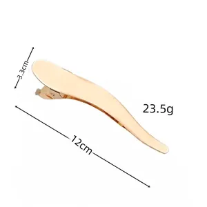 12cm golden alloy hair clip for women with dimension and weight details on white background