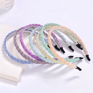 Detailed set of seven thin hand-woven beaded headbands in pastel macaron colors with soft finish