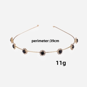 Elegant gold metal headband with sparkling black rhinestone flower charms and 39cm circumference