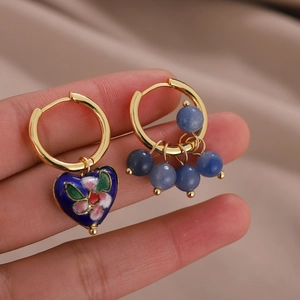 Asymmetric gold hoop earrings with blue enamel heart and floral beads for women