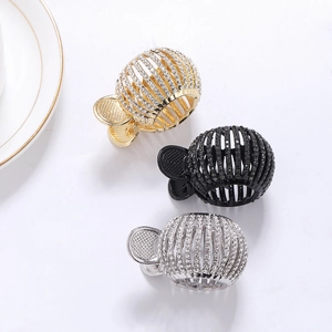 Pinces à cheveux sphériques avec strass brillants en finitions or argent et noir
