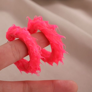 Avant-garde neon pink round earrings with unique melting texture for women