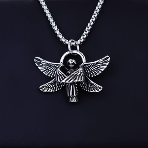 Detailed view of silver six-winged seraph angel pendant with vintage textured wings