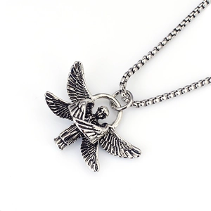 Detailed view of aged silver seraphim pendant with intricate wing texture on steel chain
