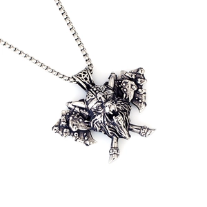 Detail view of Viking wolf axe pendant featuring intricate Nordic engravings and box chain