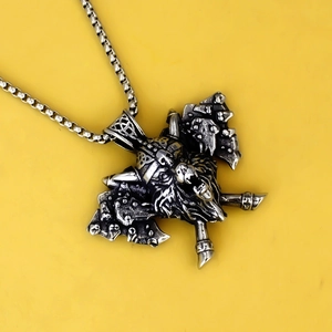 Vintage Viking necklace featuring double axes and warrior beast pendant in aged steel finish