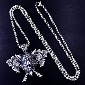 Retro Viking wolf and dual axes pendant in stainless steel on dark wood texture background
