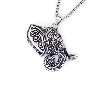 Vintage silver elephant pendant necklace with intricate bohemian mandala engraving