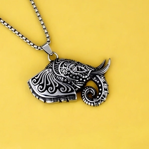 Vintage stainless steel elephant head pendant necklace with intricate ethnic carvings