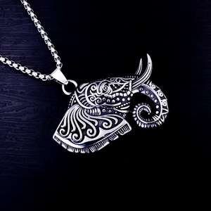 Retro stainless steel elephant head pendant necklace with intricate tribal carving details