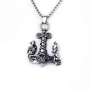 Nordic Mjolnir pendant necklace with wolf and raven relief in vintage stainless steel